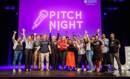 ilab Accelerator startups at Pitch Night, with Ashley Hanger at centre. Image: Anjanette Webb Group shot of Pitch Night finalists on stage with Ashley Hanger, the winner, in the middle holding the trophy